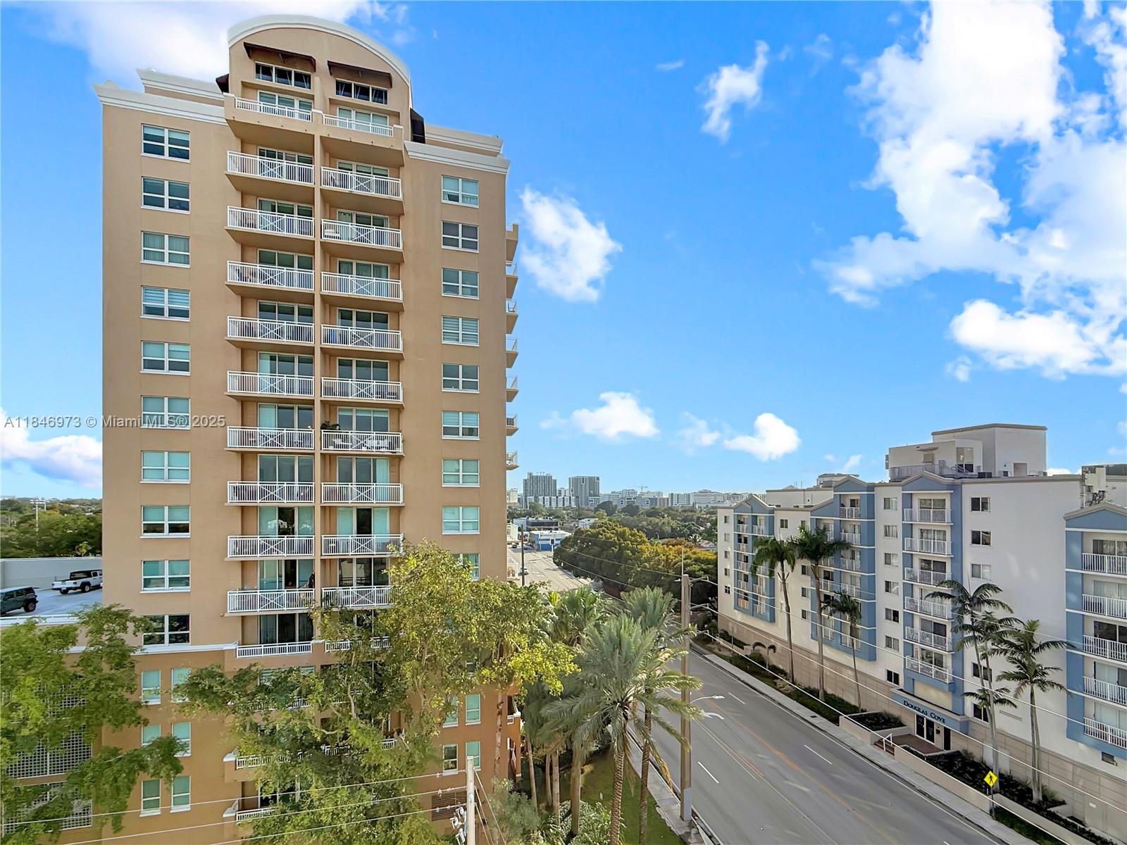 2665 Southwest 37th Avenue, Unit 408 Miami, FL 33133 - Photo 24 of 30 a view of a city with tall buildings