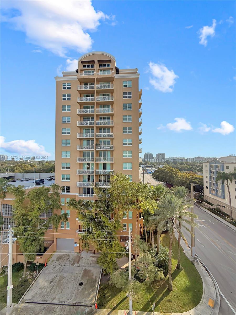 2665 Southwest 37th Avenue, Unit 408 Miami, FL 33133 - Photo 25 of 30 a view of a city with tall buildings
