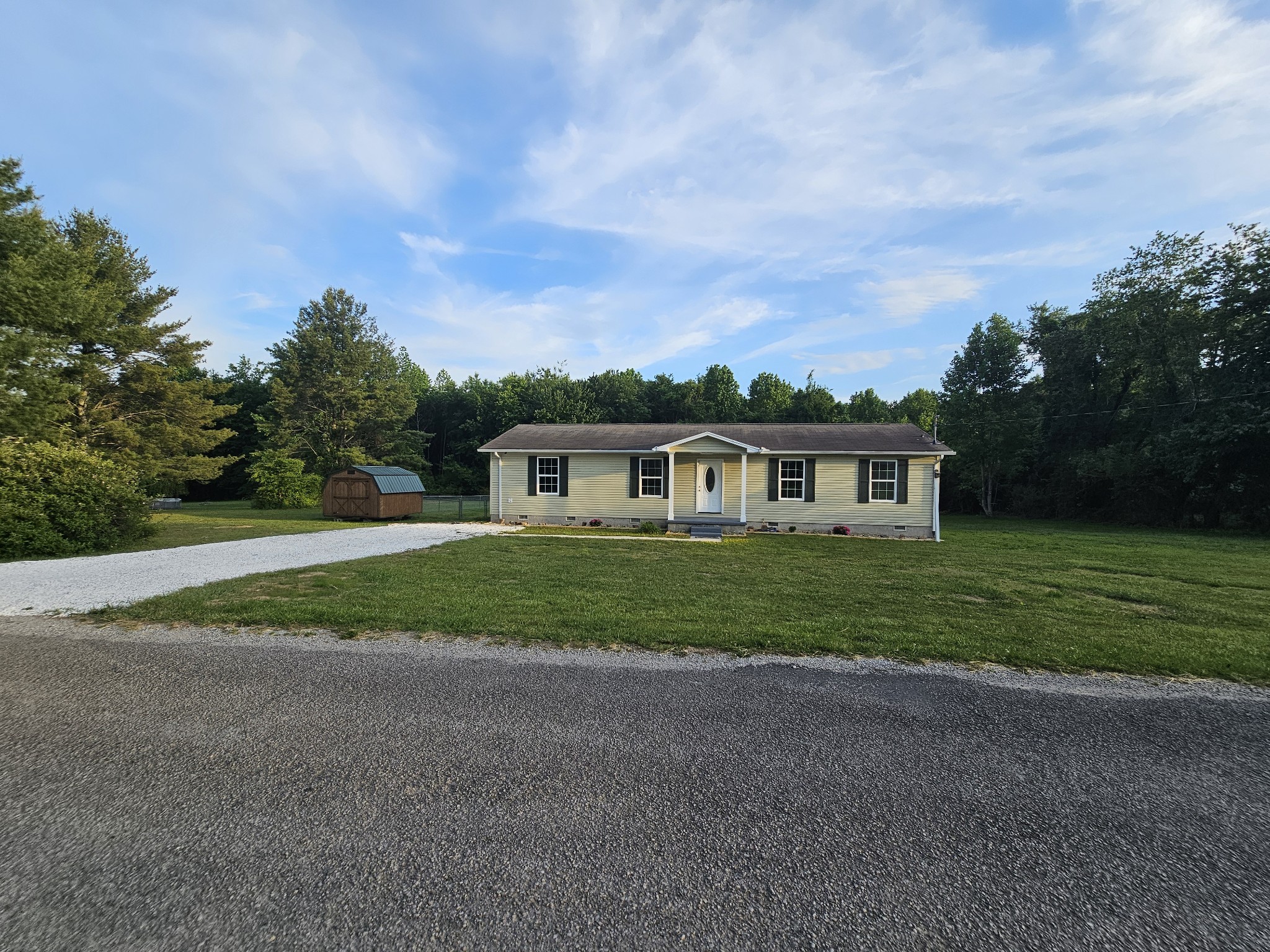 362 Forest Point Road Monteagle, TN 37356 - Photo 1 of 42 a front view of a house with a yard
