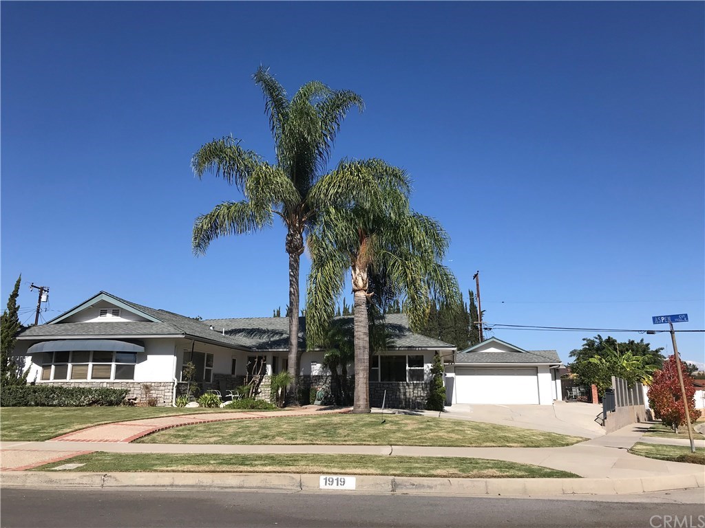 1919 Aspen Circle is located on a large corner lot of over 11,300 square feet, in a quiet neighborhood in North Fullerton.
