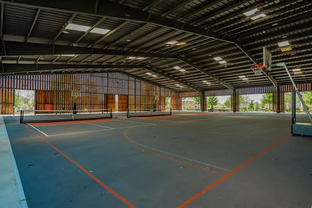 a view of a swimming pool with a patio