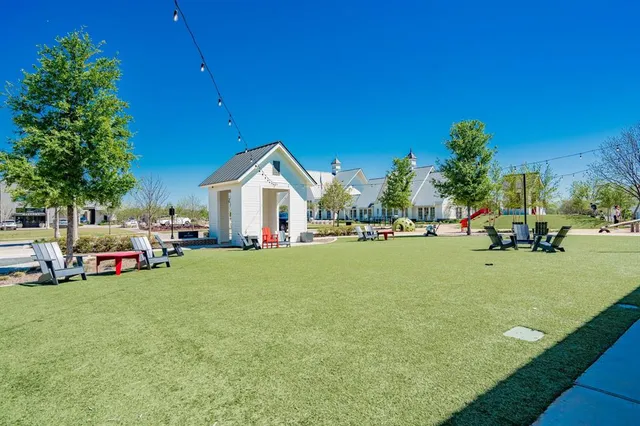 a room with gym equipment and racks