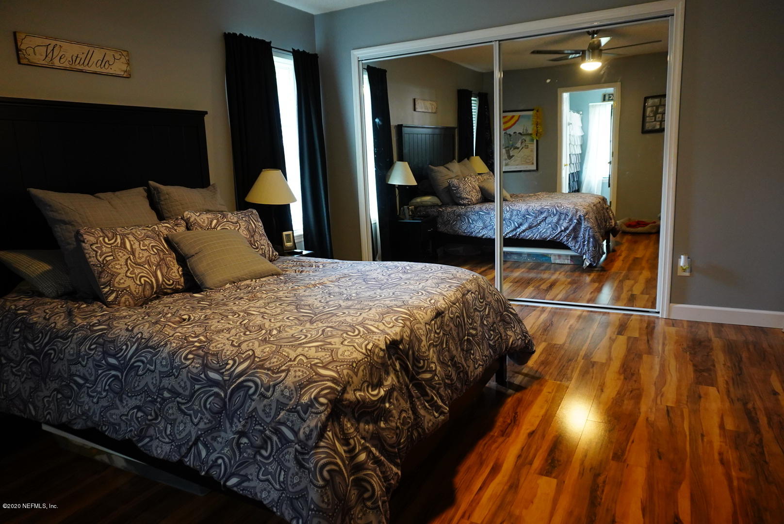 2427 Paris Mill Road Jacksonville, FL 32221 - Photo 8 of 14 a bed room with a bed and walk in closet