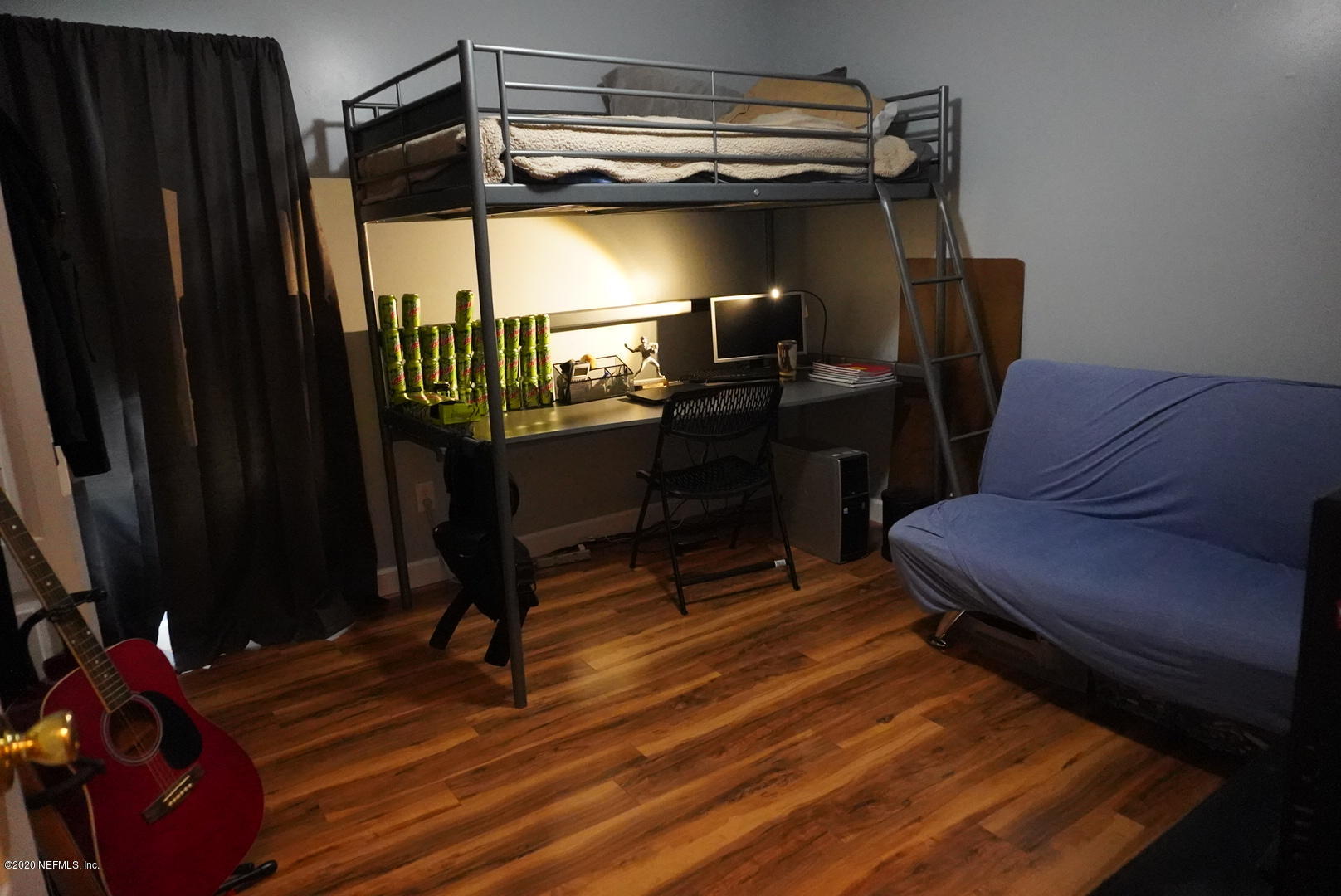 2427 Paris Mill Road Jacksonville, FL 32221 - Photo 10 of 14 a room with wooden floor and furniture