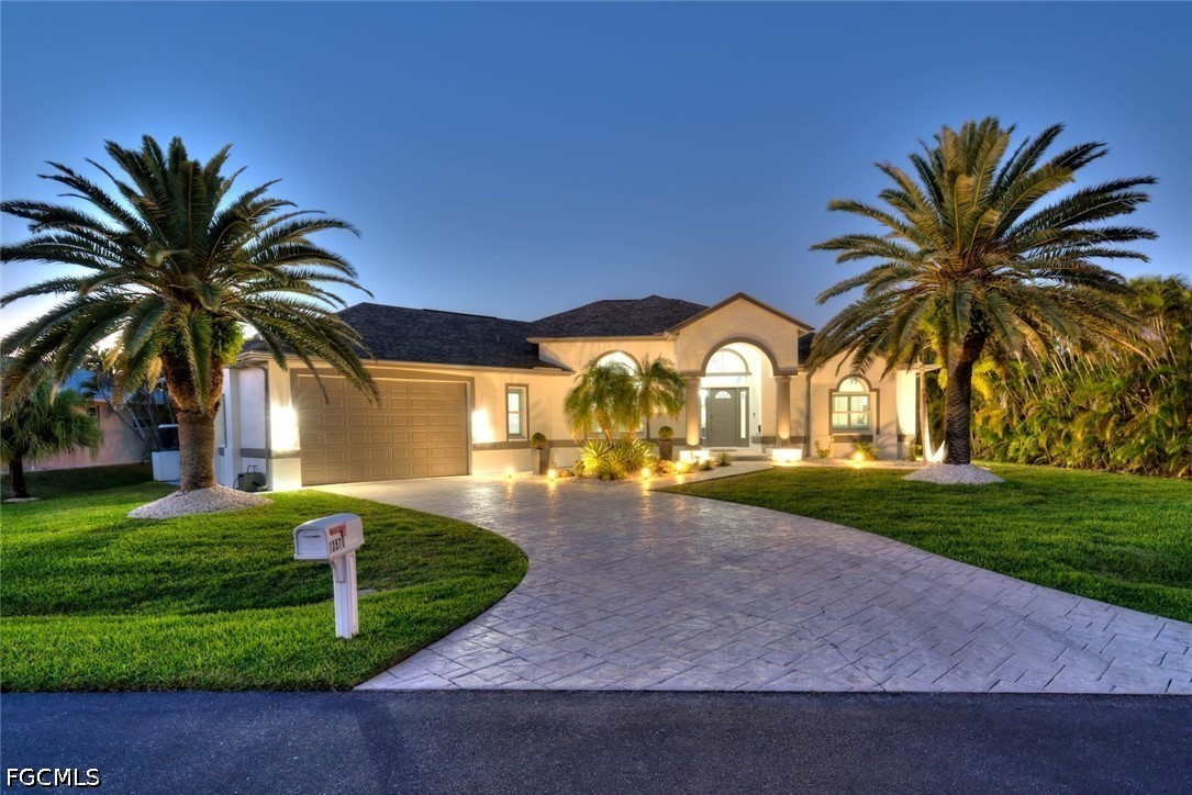 13570 Harbour Ridge Drive Fort Myers, FL 33908 - Photo 1 of 50 a view of a house with a yard