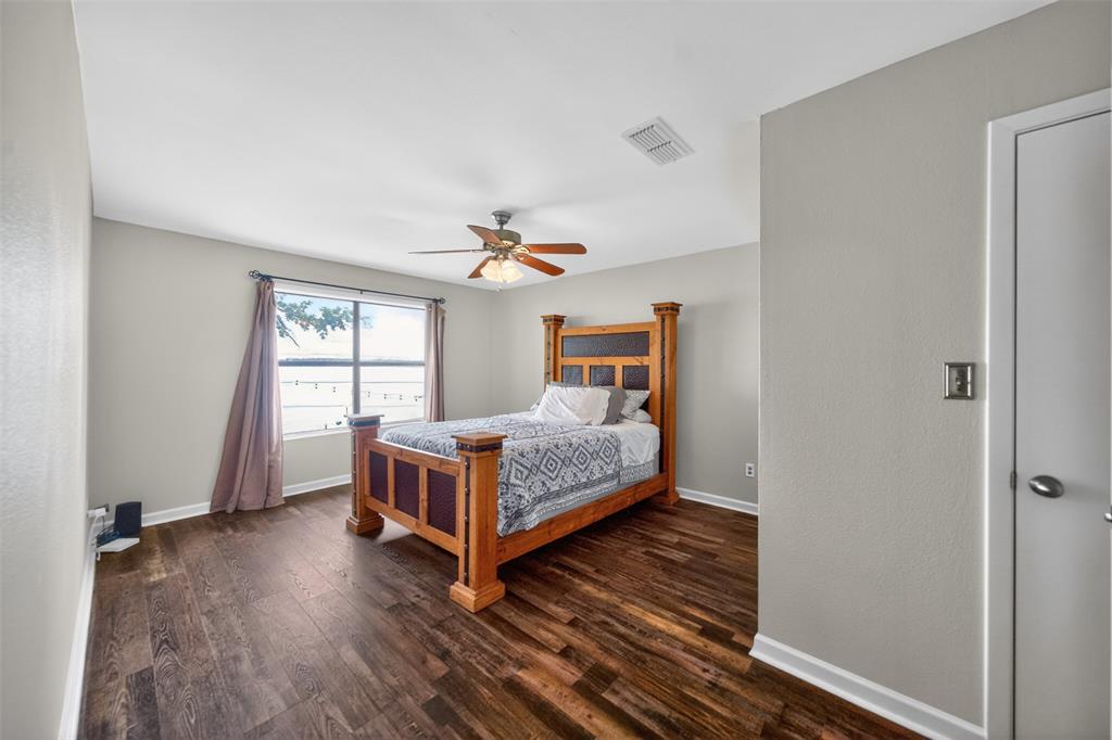 23363 Wateridge Loop Flint, TX 75762 - Photo 31 of 40 a room with a bed and a window