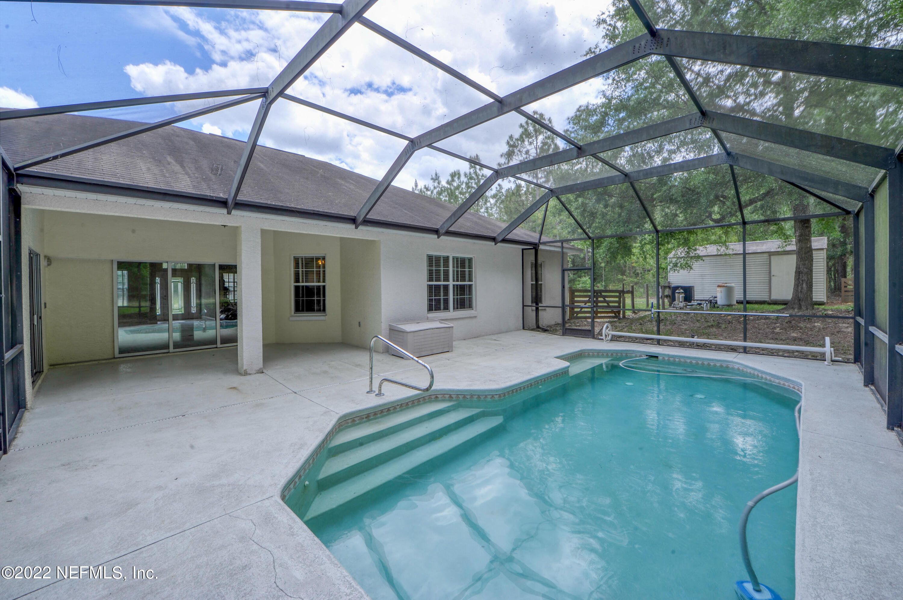 12995 Southwest 52nd Lane Road Ocala, FL 34481 - Photo 1 of 55 Pool and patio