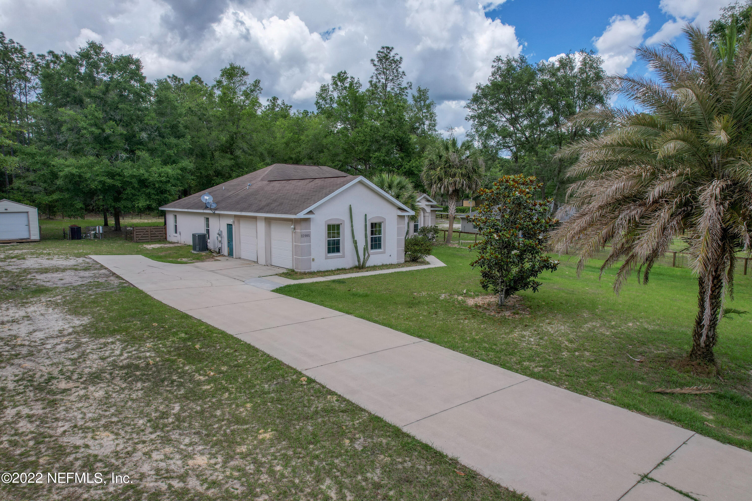 12995 Southwest 52nd Lane Road Ocala, FL 34481 - Photo 50 of 55 Side Entry Garage