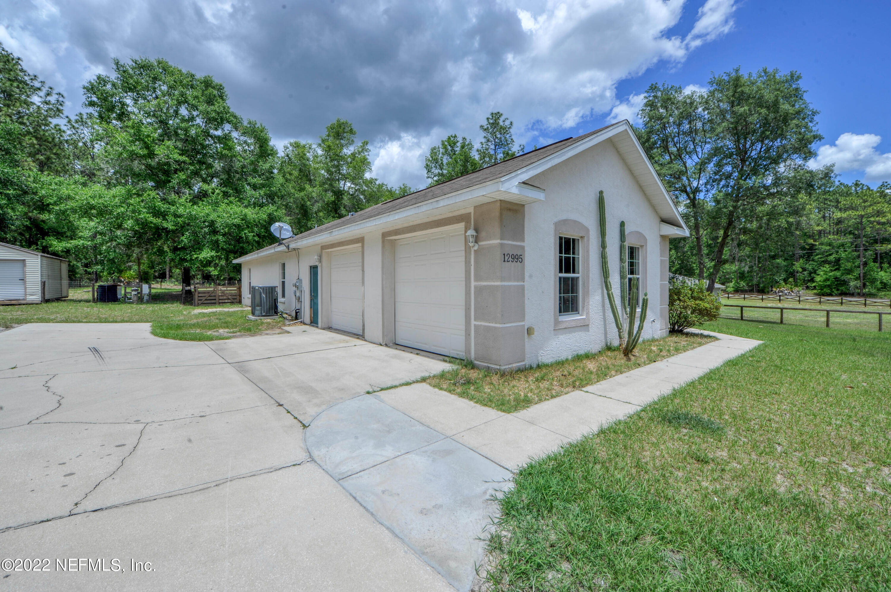 12995 Southwest 52nd Lane Road Ocala, FL 34481 - Photo 7 of 55 Side Garage