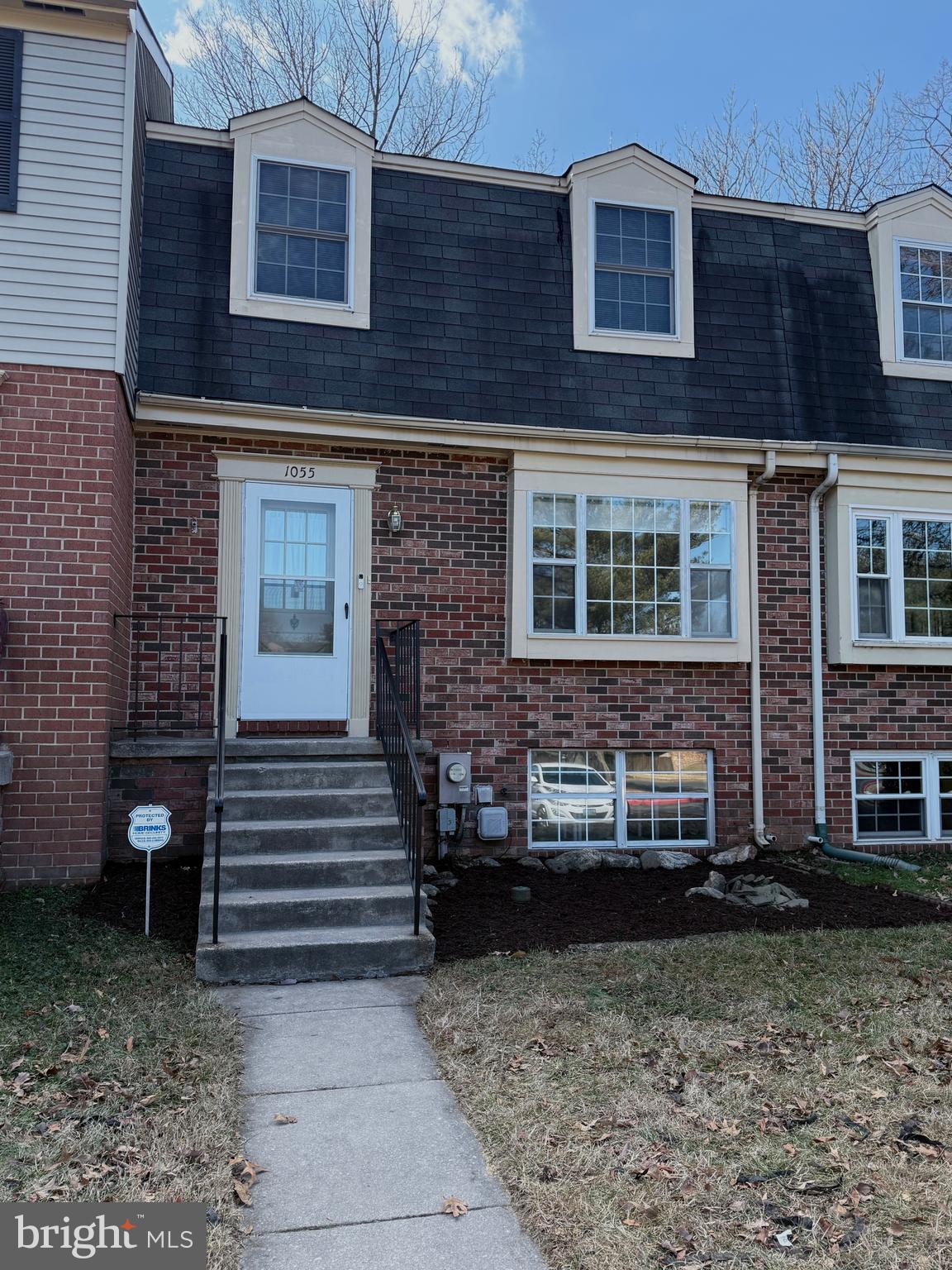 1055 Bulman Harbour Pasadena, MD 21122 - Photo 1 of 36 a front view of a house with stairs