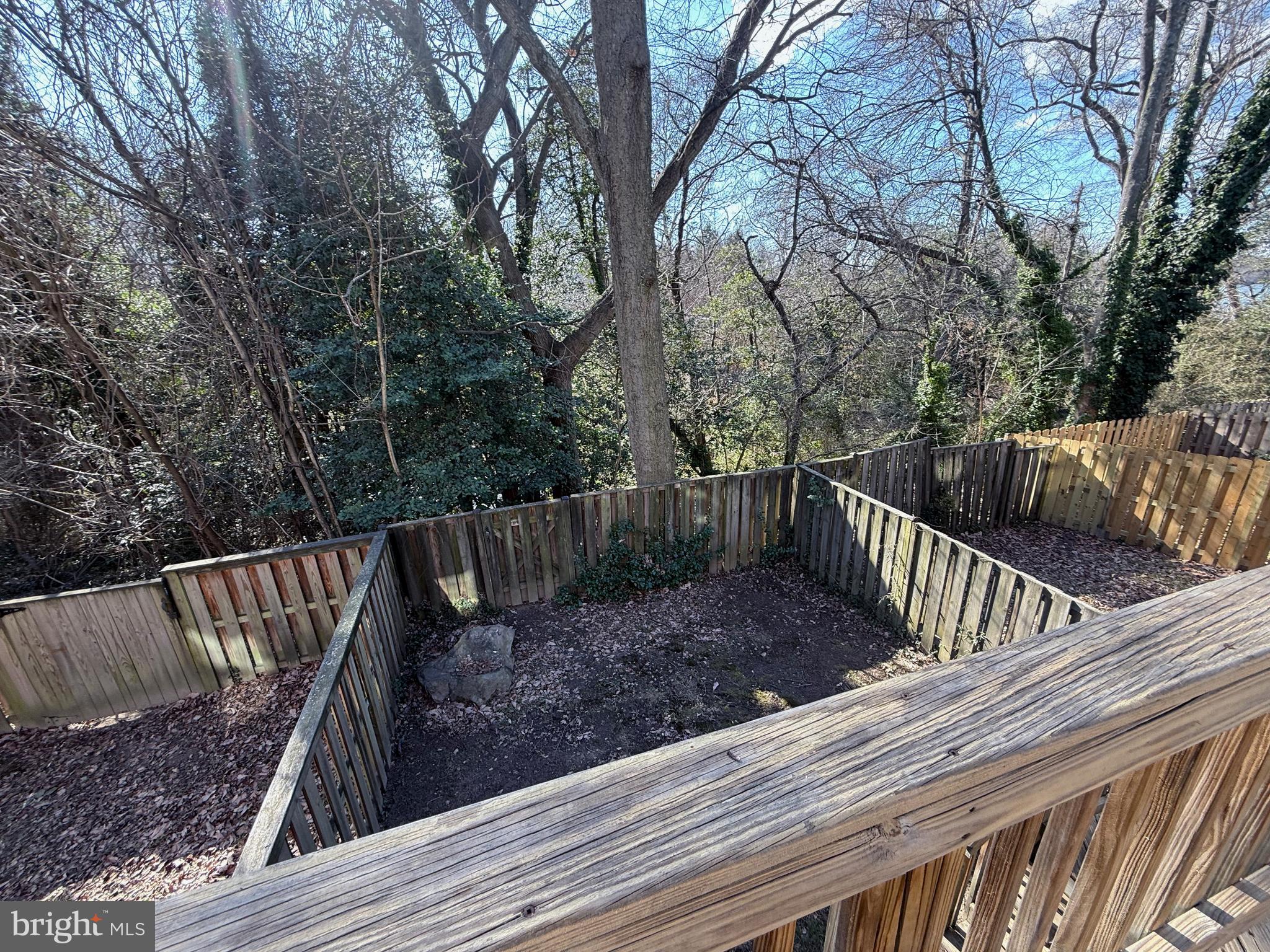 1055 Bulman Harbour Pasadena, MD 21122 - Photo 12 of 36 a view of balcony with wooden floor and fence