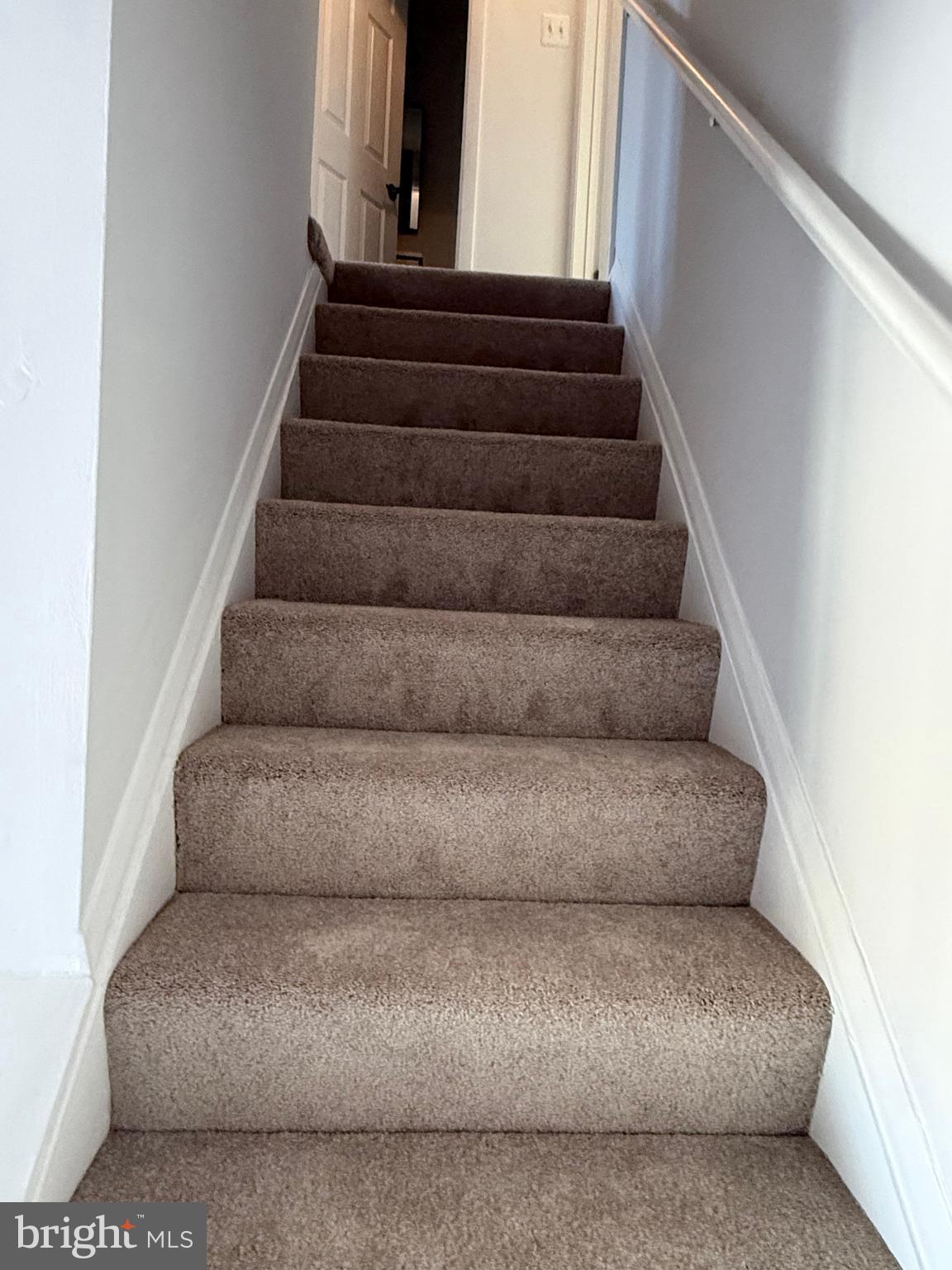 1055 Bulman Harbour Pasadena, MD 21122 - Photo 14 of 36 a view of staircase with white walls