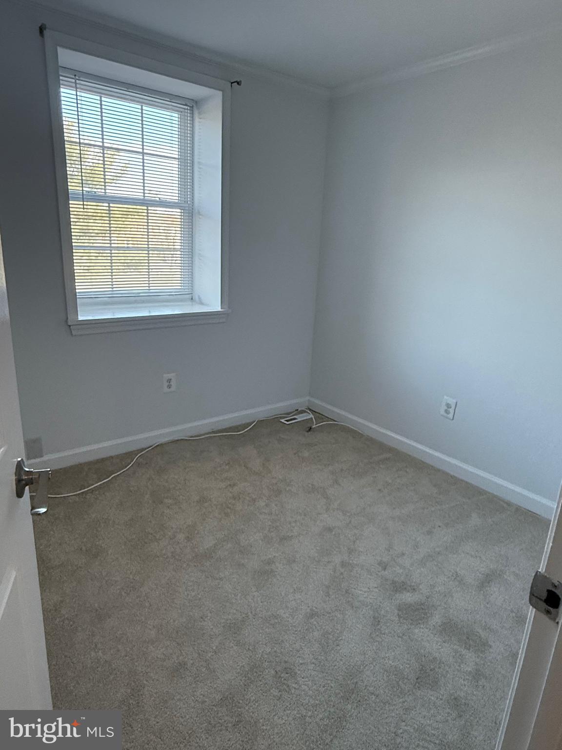 1055 Bulman Harbour Pasadena, MD 21122 - Photo 22 of 36 an empty room with a window
