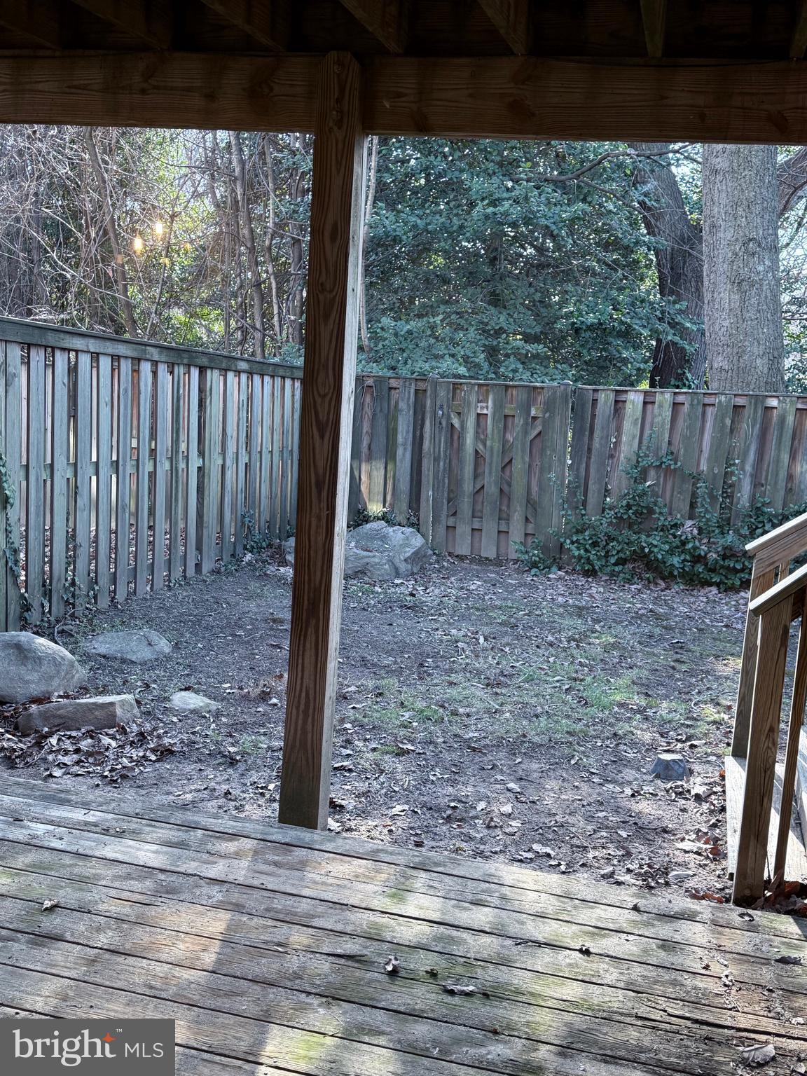 1055 Bulman Harbour Pasadena, MD 21122 - Photo 30 of 36 a view of a backyard with wooden fence