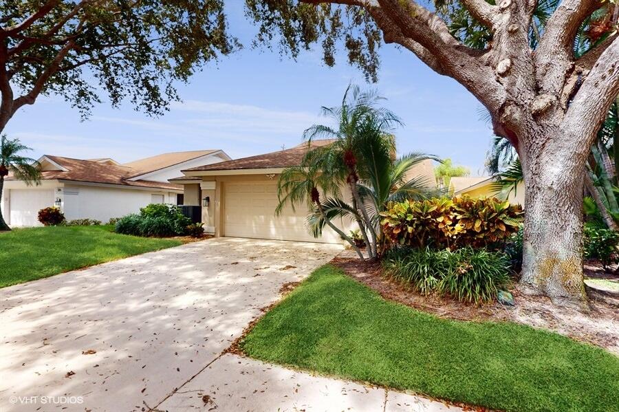 128 Cape Pointe Circle Jupiter, FL 33477 - Photo 1 of 42 01_128CAPEPOINTECIRCLE_2001_LowRes