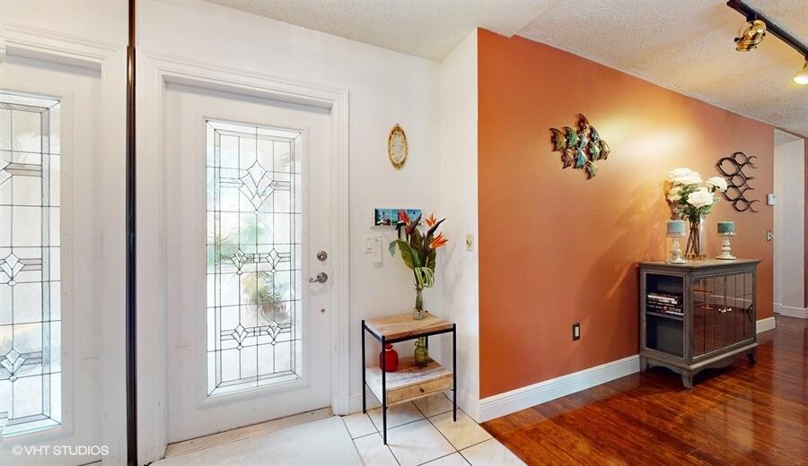 128 Cape Pointe Circle Jupiter, FL 33477 - Photo 4 of 42 04_128CAPEPOINTECIRCLE_2004_LowRes