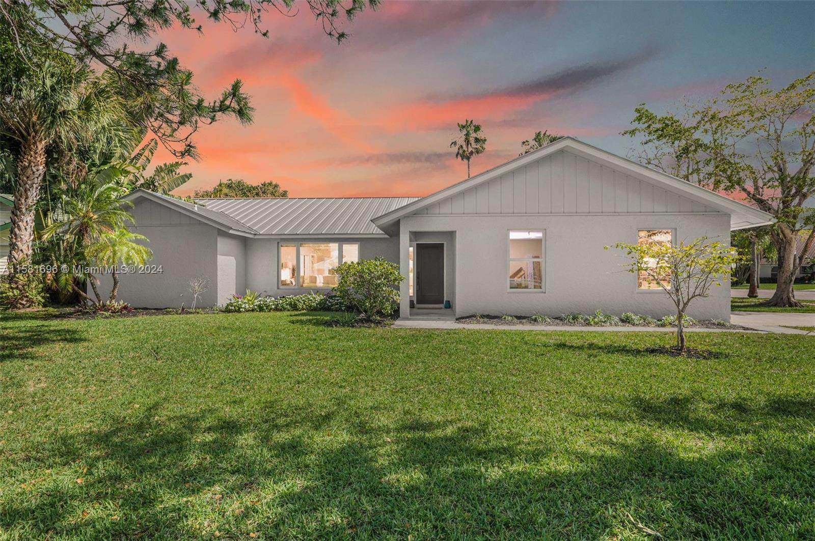 138 Buttonwood Way Tequesta, FL 33469 - Photo 14 of 27 a front view of house with a garden