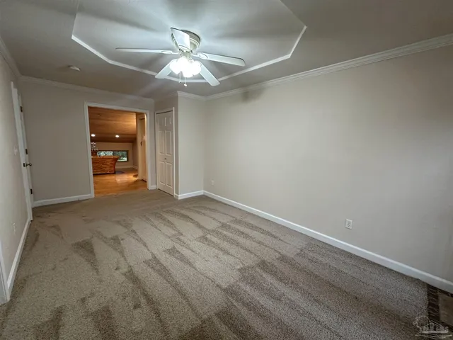 an empty room with a bathroom