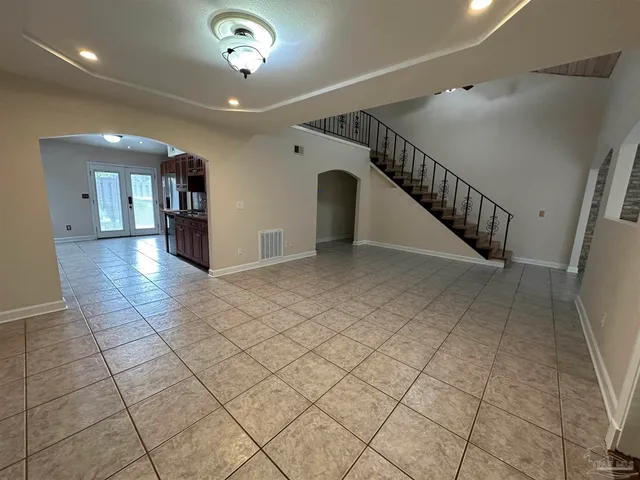 a view of entryway and hall with a window