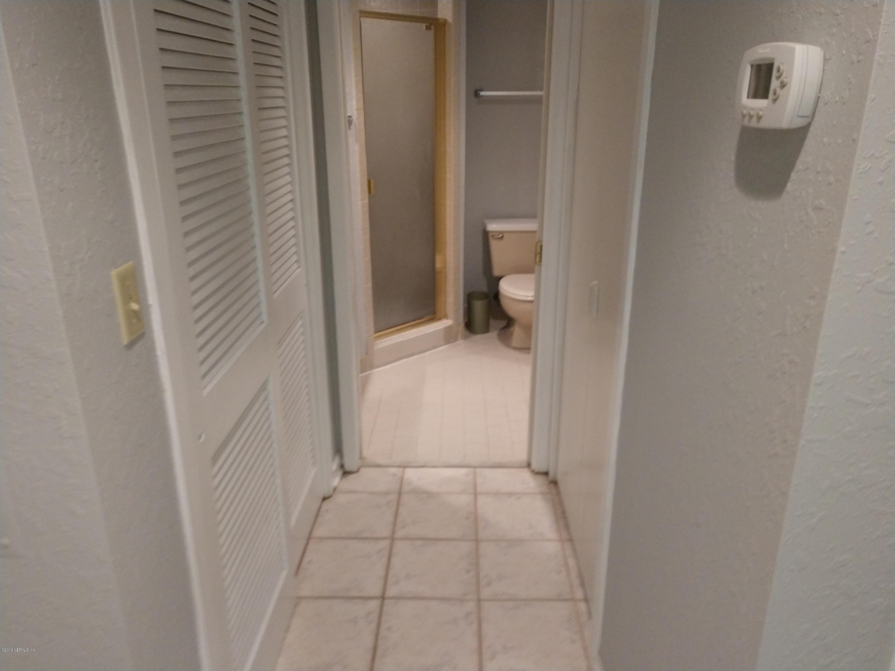 3155 Ravines Road, Unit 3527 Middleburg, FL 32068 - Photo 8 of 13 a bathroom with a sink and toilet