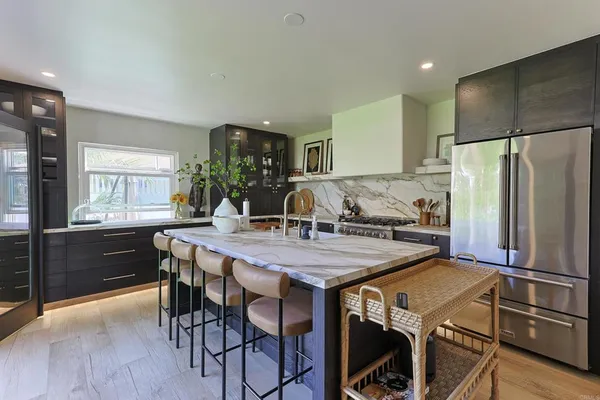 a kitchen with a stove and a sink