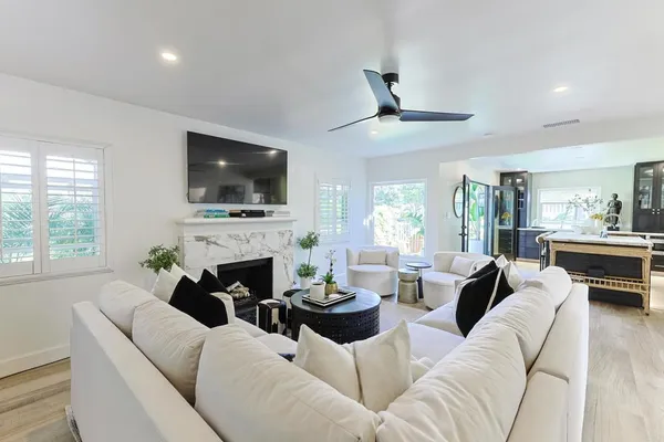 a dining room with furniture and window