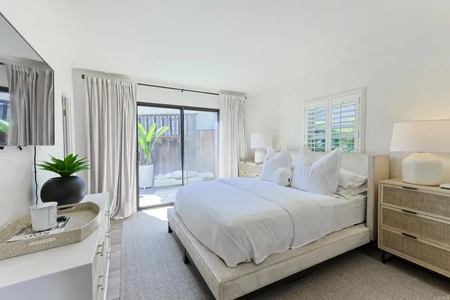 a view of outdoor dining space with a patio and a garden