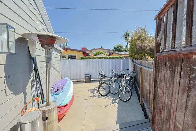 a view of a pathway with a garden