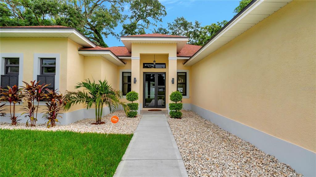 306 East Clay Avenue Brandon, FL 33510 - Photo 2 of 26 a view of a entryway door of the house