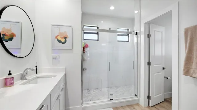 a bathroom with a sink and a mirror