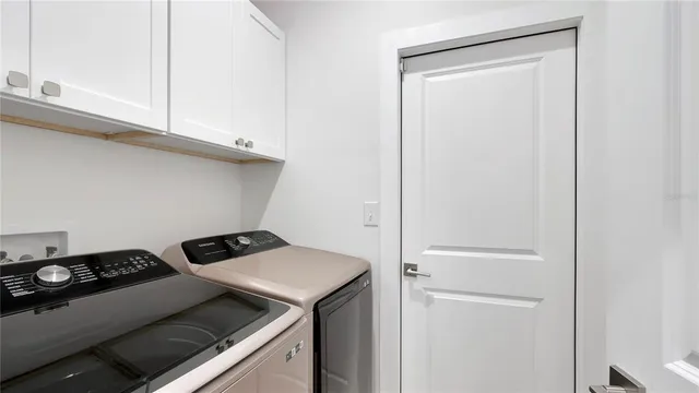 a kitchen with a stove and a microwave