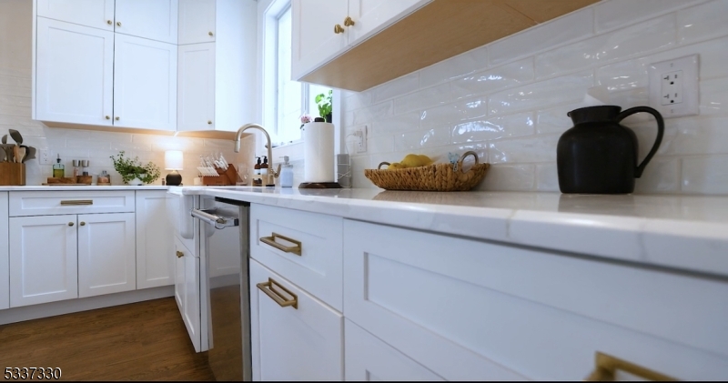134 Hillsborough Road Hillsborough, NJ 08844 - Photo 11 of 50 a kitchen with cabinets and window