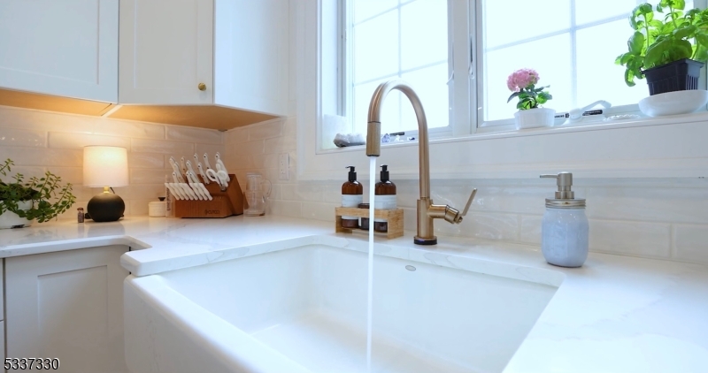 134 Hillsborough Road Hillsborough, NJ 08844 - Photo 12 of 50 a dining room with table and chairs