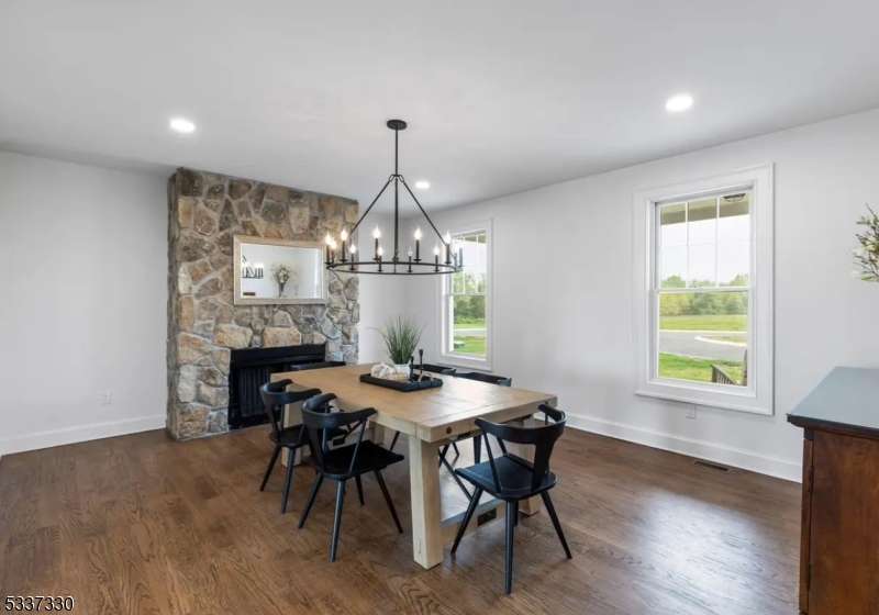 134 Hillsborough Road Hillsborough, NJ 08844 - Photo 18 of 50 a view of a dining room with furniture window and wooden floor