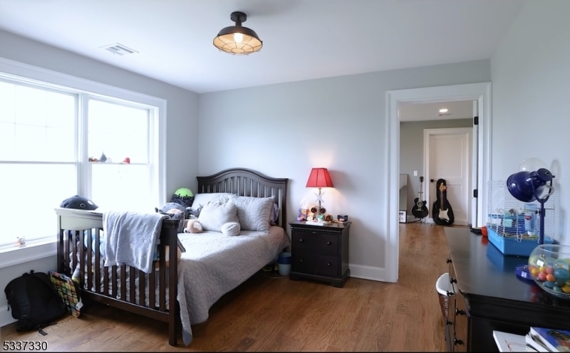 134 Hillsborough Road Hillsborough, NJ 08844 - Photo 29 of 50 a bedroom with bed and a window