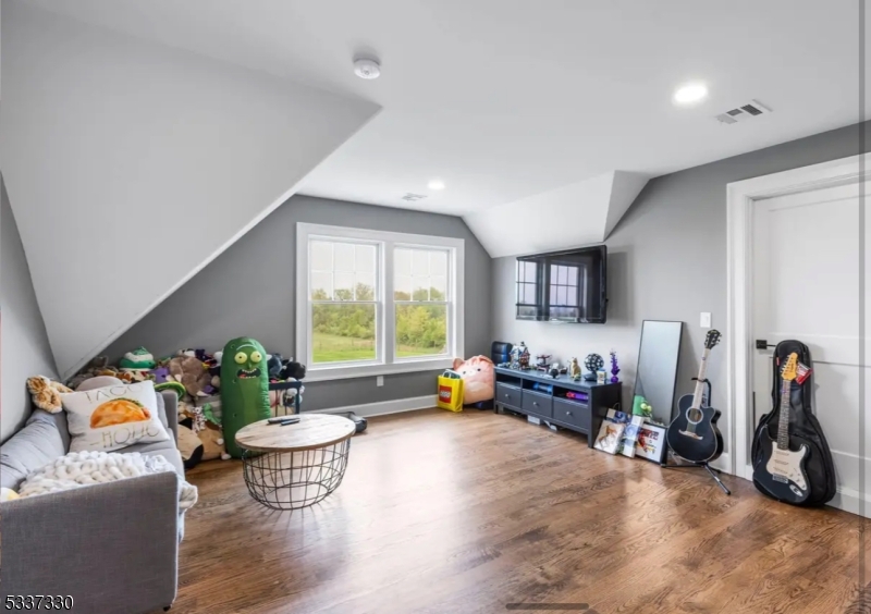 134 Hillsborough Road Hillsborough, NJ 08844 - Photo 30 of 50 a living room with furniture and a flat screen tv
