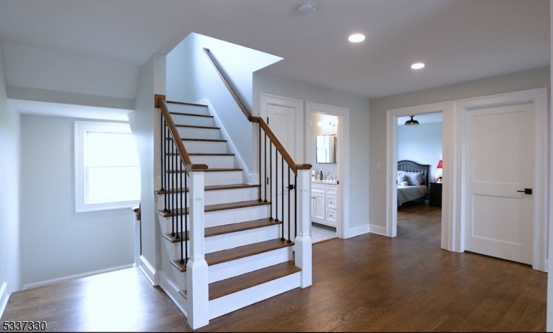 134 Hillsborough Road Hillsborough, NJ 08844 - Photo 31 of 50 a view of a livingroom with furniture and stairs