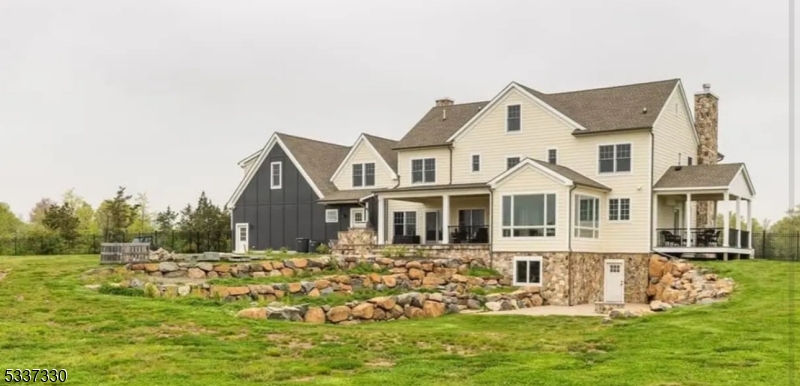 134 Hillsborough Road Hillsborough, NJ 08844 - Photo 38 of 50 a front view of a house with a yard