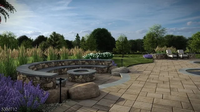 a front view of a house with a yard fire pit and outdoor seating