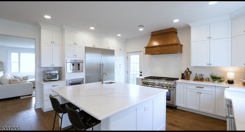 134 Hillsborough Road Hillsborough, NJ 08844 - Photo 8 of 50 a kitchen with stainless steel appliances granite countertop a stove a sink a refrigerator and a cabinets