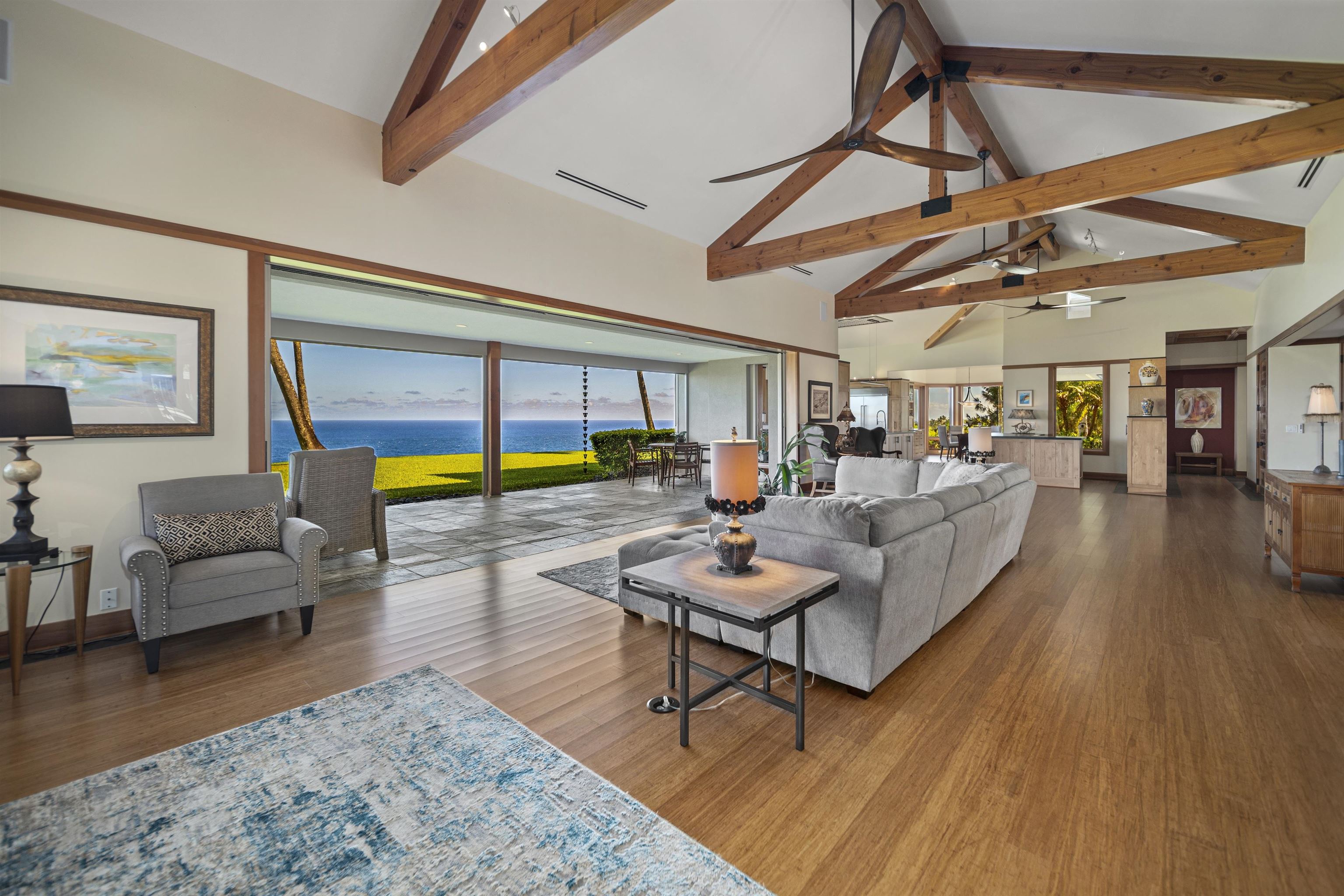 400 Mehana Road Haiku, HI 96708 - Photo 11 of 50 a living room with furniture and a wooden floor