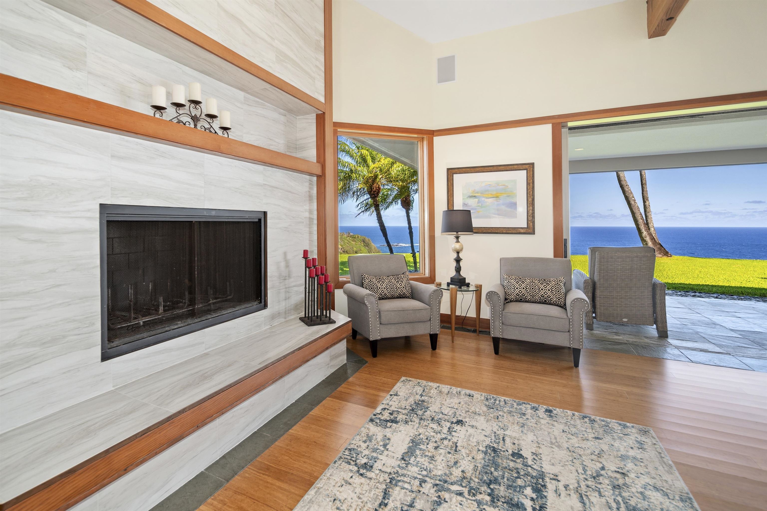 400 Mehana Road Haiku, HI 96708 - Photo 15 of 50 a living room with furniture and a fireplace