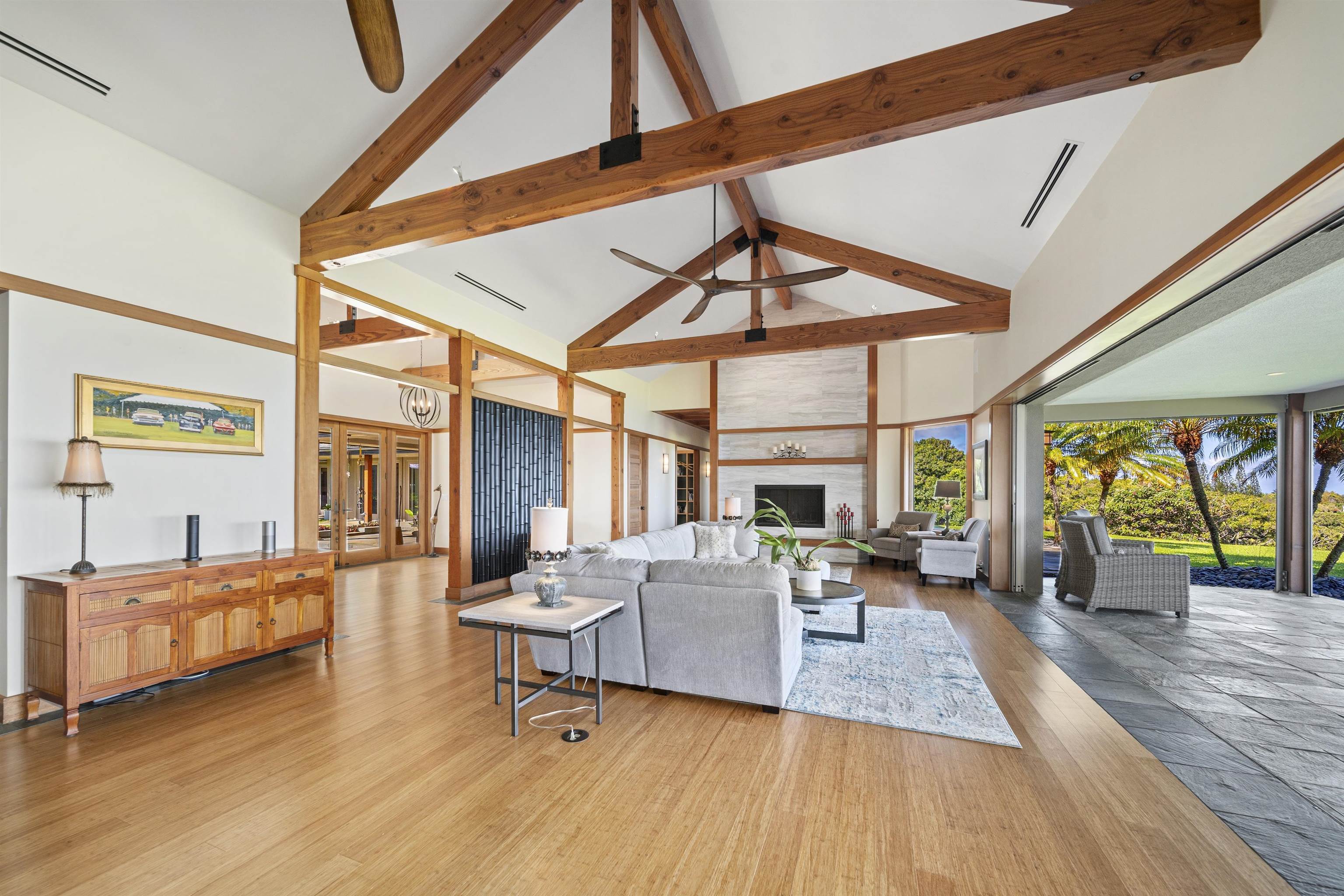 400 Mehana Road Haiku, HI 96708 - Photo 16 of 50 a living room with furniture and a large window
