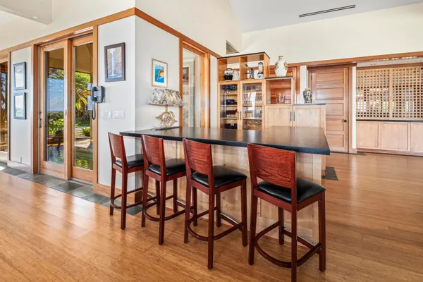 a view of a livingroom with furniture and front door