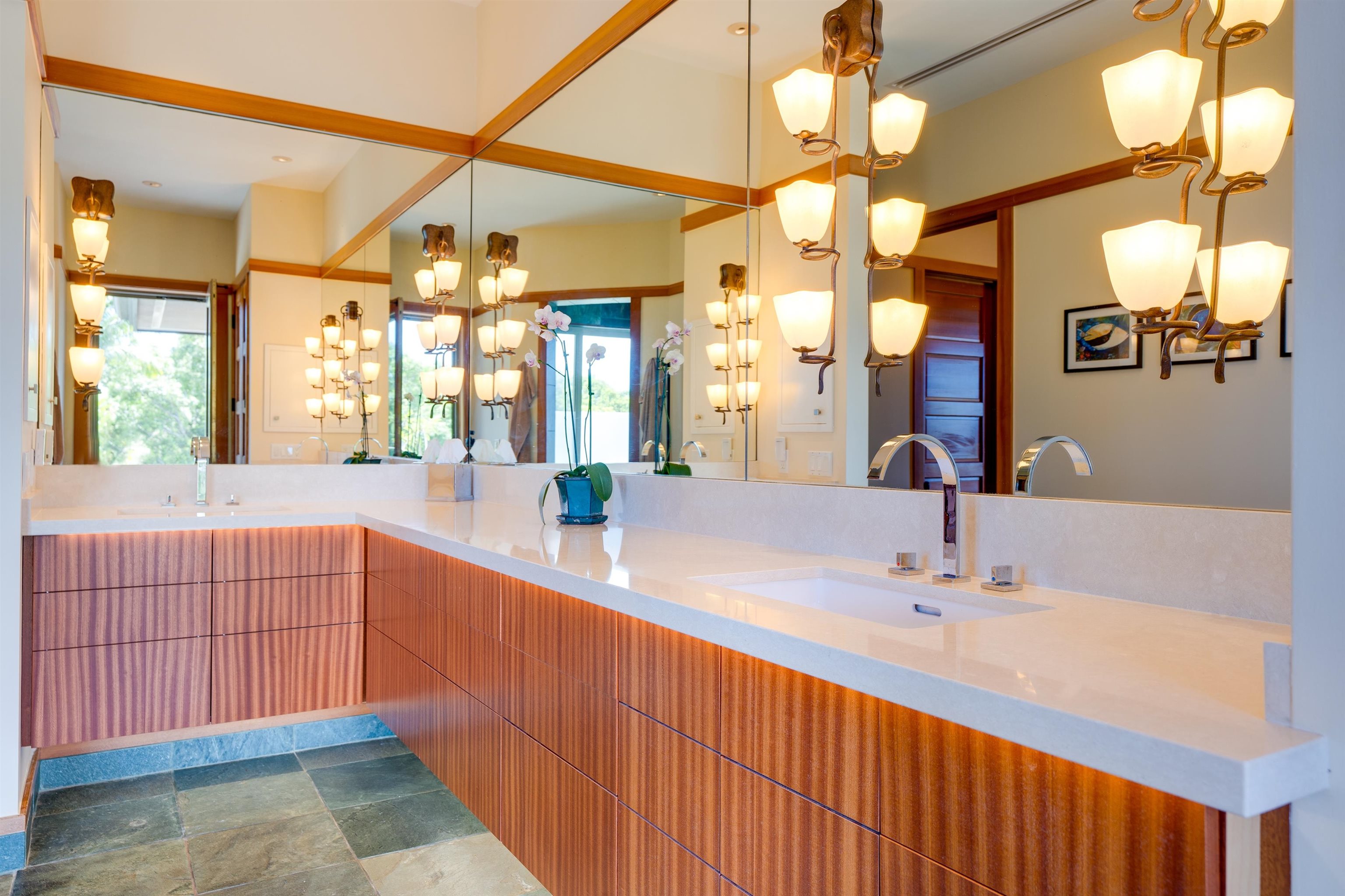 400 Mehana Road Haiku, HI 96708 - Photo 36 of 50 a bathroom with double vanity and a mirror