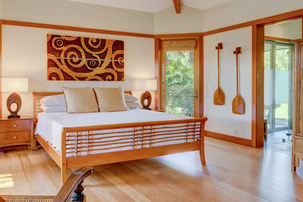 a kitchen with stainless steel appliances granite countertop a stove a sink dishwasher and cabinets with wooden floor