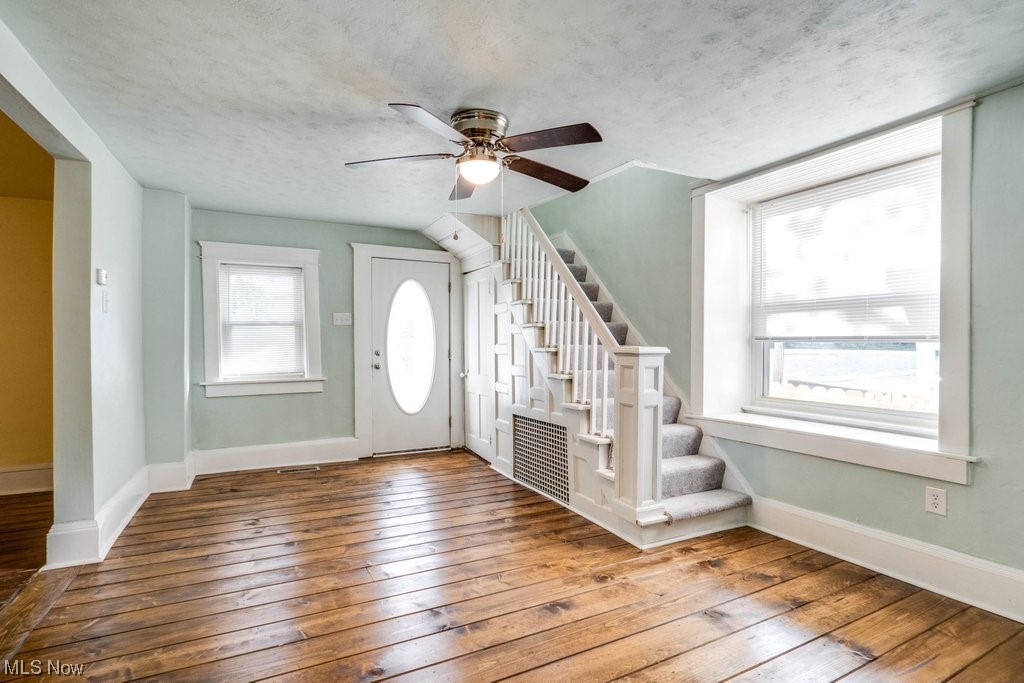 3775 East Waterloo Road Akron, OH 44312 - Photo 7 of 33 Hardwood floored foyer featuring ceiling fan