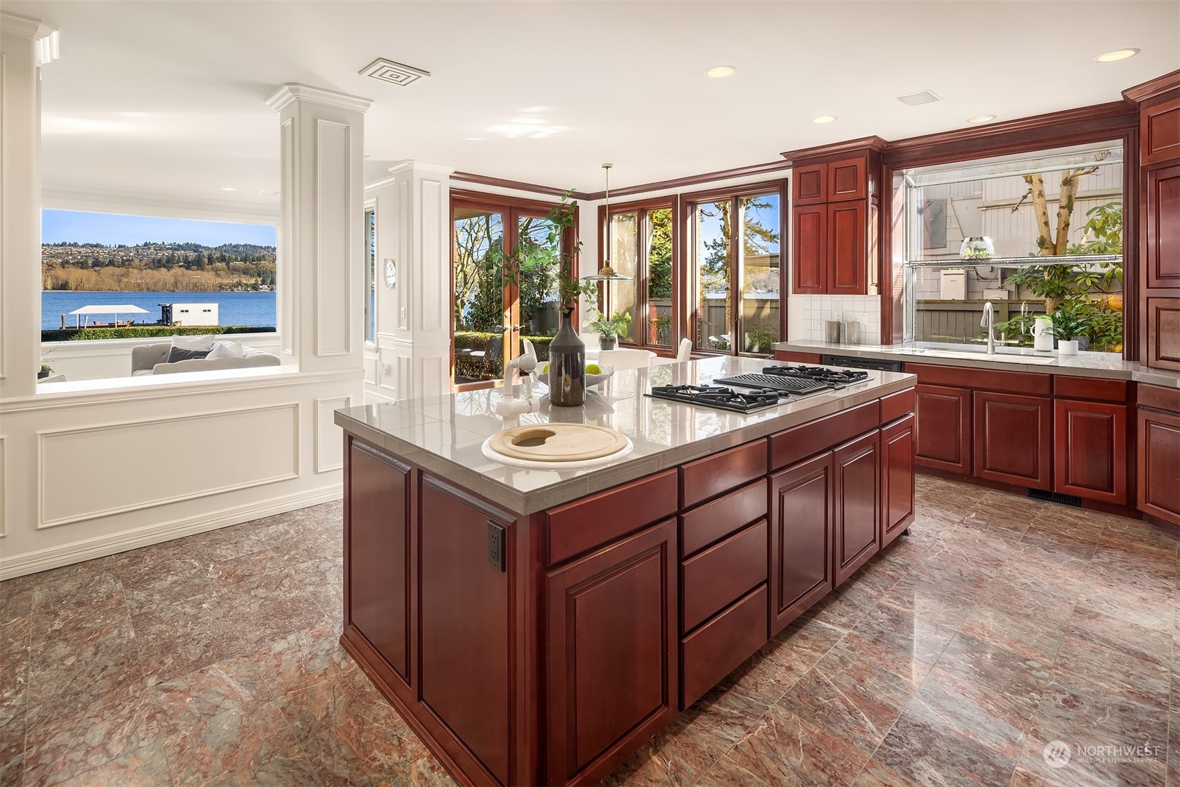 4452 Ferncroft Road Mercer Island, WA 98040 - Photo 16 of 39 a kitchen with a sink stove and cabinets
