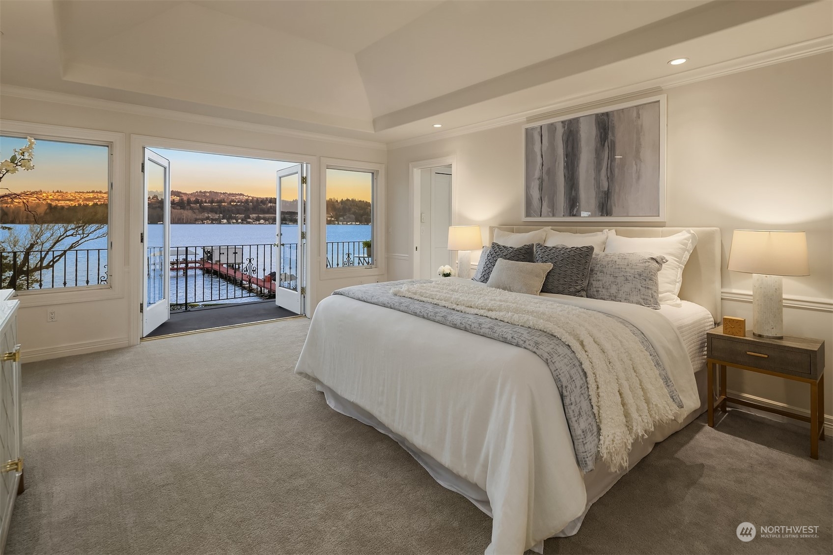 4452 Ferncroft Road Mercer Island, WA 98040 - Photo 22 of 39 a spacious bedroom with a bed and a large window