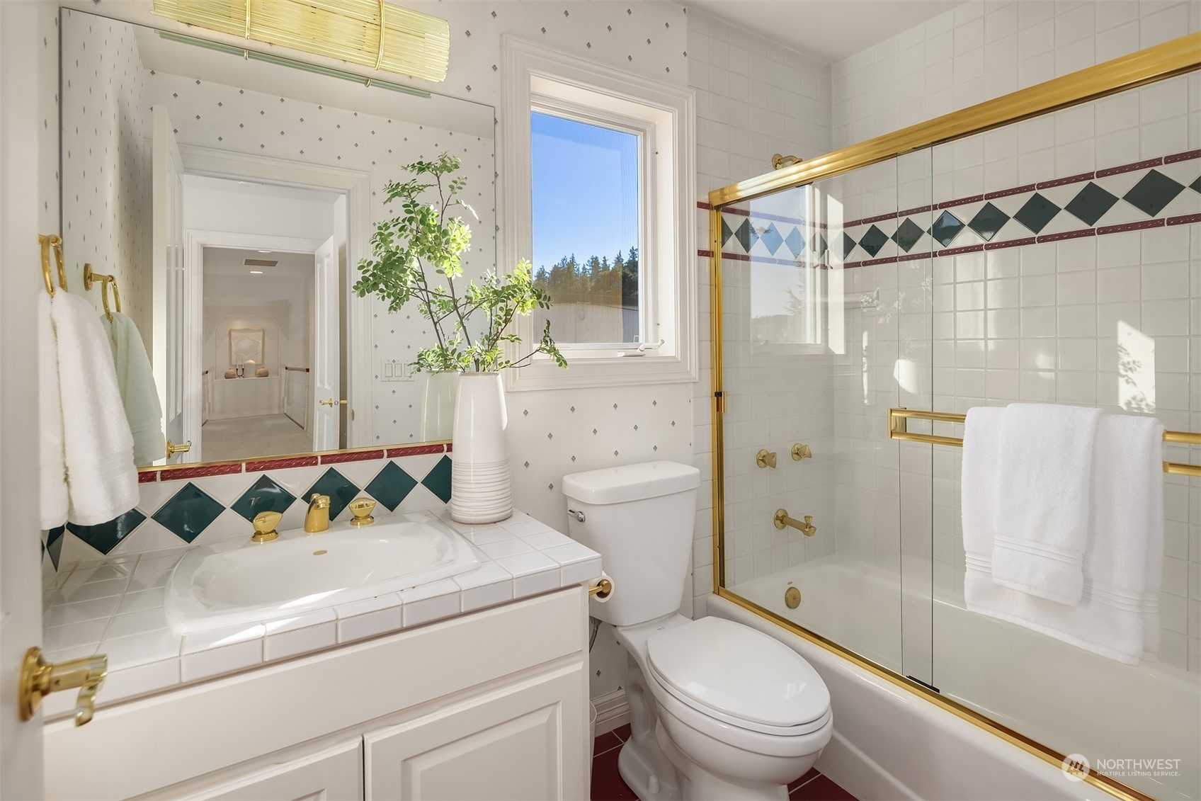 4452 Ferncroft Road Mercer Island, WA 98040 - Photo 27 of 39 a bathroom with a sink toilet and shower